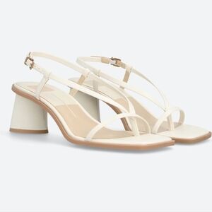 Dolce Vita Gemini Women's Wedge Sandals in ivory leather.